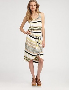 Decorated by contrasting stripes, this jersey scoopneck has an asymmetrical hi-low hem and waist-enhancing self tie. ScoopneckSleevelessSelf tie at drop waistAsymmetrical hi-low hemAbout 27 from natural waist96% rayon/4% spandexDry cleanMade in USAModel shown is 5'10 (177cm) wearing US size Small. Decorated by contrasting stripes, this jersey scoopneck has an asymmetrical hi-low hem and waist-enhancing self tie. ScoopneckSleevelessSelf tie at drop waistAsymmetrical hi-low hemAbout 27 from natural waist96% rayon/4% spandexDry cleanMade in USAModel shown is 5'10 (177cm) wearing US size Small.