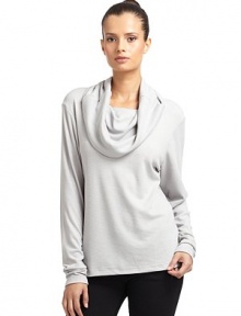 THE LOOKAllover waffle knit constructionDraped turtleneckTHE FITAbout 25 from shoulder to hemTHE MATERIALPolyester/rayon/spandexCARE & ORIGINMachine washImportedModel shown is 5'9½ (176cm) wearing US size Small. THE LOOKAllover waffle knit constructionDraped turtleneckTHE FITAbout 25 from shoulder to hemTHE MATERIALPolyester/rayon/spandexCARE & ORIGINMachine washImportedModel shown is 5'9½ (176cm) wearing US size Small.