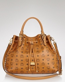 Give your look an edgy jolt with this drawstring bag from MCM. Made from logo-stamped coated canvas, it boasts a slouchy silhouette that perfects insouciant style. Give your look an edgy jolt with this drawstring bag from MCM. Made from logo-stamped coated canvas, it boasts a slouchy silhouette that perfects insouciant style.