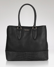 Day bags don't come easier than this subtly embossed style from Max Mara. Crafted from ultra-soft leather and and designed to fit perfectly over the shoulder, it's our favorite way to carry on. Day bags don't come easier than this subtly embossed style from Max Mara. Crafted from ultra-soft leather and and designed to fit perfectly over the shoulder, it's our favorite way to carry on.