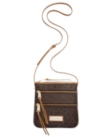 Perfectly portable, this compact crossbody from Calvin Klein will take you from a Saturday night in the city to a Sunday brunch in the burbs. Signature pattern design complements the shiny hardware details, while the adjustable strap keeps hands free to access all your essentials. Perfectly portable, this compact crossbody from Calvin Klein will take you from a Saturday night in the city to a Sunday brunch in the burbs. Signature pattern design complements the shiny hardware details, while the adjustable strap keeps hands free to access all your essentials.