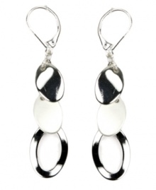 Shake up your look with subtle shimmer. Nine West's reflective drop earrings feature circular charms in silver tone mixed metal. Approximate drop: 2 inches. Shake up your look with subtle shimmer. Nine West's reflective drop earrings feature circular charms in silver tone mixed metal. Approximate drop: 2 inches.