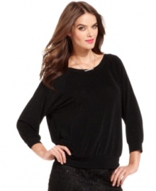 With allover subtle sparkles, this RACHEL Rachel Roy sweater is a stylish layering piece!