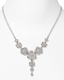 Nix the minimalism and opt for a statement piece like this sterling silver and crystal necklace from Nadri. It's camellia shaped stations lend opulent glamour to occasion looks. Nix the minimalism and opt for a statement piece like this sterling silver and crystal necklace from Nadri. It's camellia shaped stations lend opulent glamour to occasion looks.