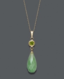 Serene and stylish. This tranquil pendant features a faceted jade teardrop (18 mm x 8 mm) accented by a sparkling, round-cut peridot (1 ct. t.w.). Setting and chain crafted in 14k gold. Approximate length: 18 inches. Approximate drop: 1-1/4 inches.