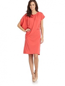 THE LOOKGathered round necklineSide draped self overlayCap sleevesElastic waistTHE FITAbout 40 from shoulder to hemTHE MATERIAL70% rayon/24% polyester/6% spandexCARE & ORIGINDry cleanImportedModel shown is 5'9½ (176cm) wearing US size Small. THE LOOKGathered round necklineSide draped self overlayCap sleevesElastic waistTHE FITAbout 40 from shoulder to hemTHE MATERIAL70% rayon/24% polyester/6% spandexCARE & ORIGINDry cleanImportedModel shown is 5'9½ (176cm) wearing US size Small.