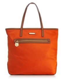 Pack up and go almost anywhere with this classic carryall from MICHAEL by Michael Kors. Signature 18k gold hardware dress up the casual nylon design, while the roomy interior features plenty of pockets to safely stow all the essentials. Pack up and go almost anywhere with this classic carryall from MICHAEL by Michael Kors. Signature 18k gold hardware dress up the casual nylon design, while the roomy interior features plenty of pockets to safely stow all the essentials.