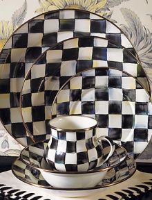 A charming way to add color and personality to the dinner table, crafted in a checkerboard juxtaposition of ivory and onyx with bronzed stainless steel trim. Enameled steel 12 diam. Dishwasher safe Made in USA A charming way to add color and personality to the dinner table, crafted in a checkerboard juxtaposition of ivory and onyx with bronzed stainless steel trim. Enameled steel 12 diam. Dishwasher safe Made in USA