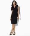 This petite Lauren by Ralph Lauren dress exudes timeless polish in soft stretch jersey with crisp pressed pleats for a flattering, feminine sheath silhouette that elegantly hugs the body. (Clearance)