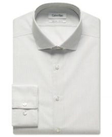 Stripes step up your style with this no-fuss no-iron slim-fit dress shirt from Calvin Klein.