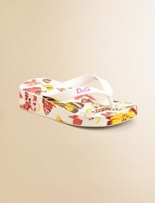 Cheery butterflies flutter across the footbed of this pretty, beach-y style.PVC upperLogo on thong strapPVC wedge soleImported Cheery butterflies flutter across the footbed of this pretty, beach-y style.PVC upperLogo on thong strapPVC wedge soleImported