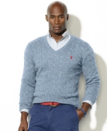Cable-knit in luxurious tussah silk yarns for lightweight warmth, a classic-fitting V-neck sweater makes the perfect preppy layering piece. Cable-knit in luxurious tussah silk yarns for lightweight warmth, a classic-fitting V-neck sweater makes the perfect preppy layering piece.