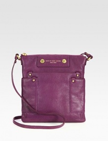 A slim and chic style in luxurious pebbled leather with radiant hardware.Adjustable shoulder strap, 17-19 dropTop zip closureThree outside open pocketsOne inside zip pocketTwo inside open pocketsFully lined9½W X 10H X ½DImported A slim and chic style in luxurious pebbled leather with radiant hardware.Adjustable shoulder strap, 17-19 dropTop zip closureThree outside open pocketsOne inside zip pocketTwo inside open pocketsFully lined9½W X 10H X ½DImported