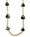 Long story. AK Anne Klein's chic long chain necklace is adorned with bronze-hued plastic beads. Crafted in gold tone mixed metal, it's a fashionable addition for your fall wardrobe. Approximate length: 36 inches.