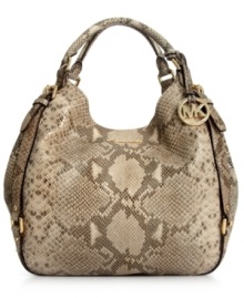 An absolute snake charmer, this posh python-embossed leather tote from MICHAEL Michael Kors is the accessory of the season. Soft leather is adorned with golden buckle and stud accents, while the roomy interior provides three separate compartments to keep you organized on-the-go. An absolute snake charmer, this posh python-embossed leather tote from MICHAEL Michael Kors is the accessory of the season. Soft leather is adorned with golden buckle and stud accents, while the roomy interior provides three separate compartments to keep you organized on-the-go.