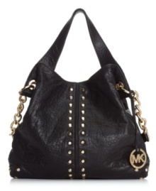 Elegance with attitude, this leather lovely from MICHAEL Michael Kors has a decidedly downtown vibe. Embellished with gleaming stud accents, chain-link detailing and signature hardware, it's the ultimate urban-cool accessory. Elegance with attitude, this leather lovely from MICHAEL Michael Kors has a decidedly downtown vibe. Embellished with gleaming stud accents, chain-link detailing and signature hardware, it's the ultimate urban-cool accessory.