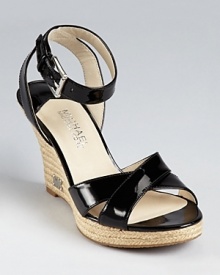 A timeless espadrille from MICHAEL Michael Kors--available in oh-so-classic black or white.