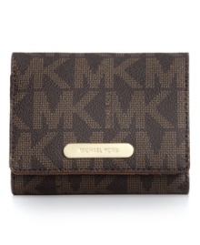 Signature style takes center stage with this monogram wallet from MICHAEL Michael Kors. Rich Saffiano leather is accented with golden hardware, while the pocket-lined interior stashes essentials with ease. Signature style takes center stage with this monogram wallet from MICHAEL Michael Kors. Rich Saffiano leather is accented with golden hardware, while the pocket-lined interior stashes essentials with ease.