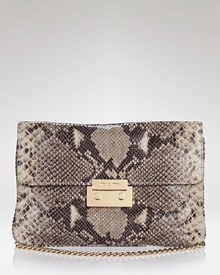 MICHAEL Michael Kors' embossed python clutch lends exotic appeal after hours. Dual purpose, this convertible bag is equally enticing over the shoulder or tucked under a LBD. MICHAEL Michael Kors' embossed python clutch lends exotic appeal after hours. Dual purpose, this convertible bag is equally enticing over the shoulder or tucked under a LBD.