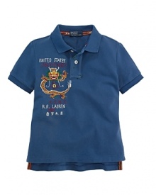 An array of embroidery and screen-printed details give a modern update to a classic polo shirt. An array of embroidery and screen-printed details give a modern update to a classic polo shirt.