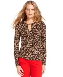 A glamorous animal print ensures that this long-sleeved tee from MICHAEL Michael Kors adds drama to any ensemble. The keyhole neckline gives it an alluring finishing touch.