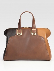 Supple colorblocked Italian leather, finished with goldtone hardware and a detachable shoulder strap.Top handles, 5 drop Removable, adjustable shoulder strap, 18-24 drop Top zip closure Protective metal feet One inside zip pocket Two inside open pockets Cotton lining 14½W X 12H X 7D Made in Italy Supple colorblocked Italian leather, finished with goldtone hardware and a detachable shoulder strap.Top handles, 5 drop Removable, adjustable shoulder strap, 18-24 drop Top zip closure Protective metal feet One inside zip pocket Two inside open pockets Cotton lining 14½W X 12H X 7D Made in Italy