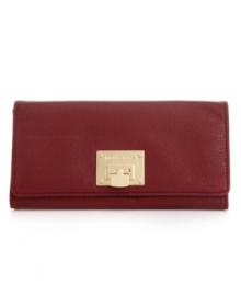 Poised and practical, MICHAEL Michael Kors brings an elegant outlook to everyday accessorizing with this rich leather carryall, featuring signature golden detailing. Ideally sized to slip inside a handbag, it boasts plenty of pockets and compartments for all the essentials. Poised and practical, MICHAEL Michael Kors brings an elegant outlook to everyday accessorizing with this rich leather carryall, featuring signature golden detailing. Ideally sized to slip inside a handbag, it boasts plenty of pockets and compartments for all the essentials.