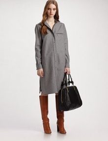 Inspired by the shirtdress and tailored in soft wool flannel with clean, classic lines and perfect details.Band collar Snap front Besom pocket with logo tab Long sleeves with snap cuffs Shirttail hem Back yoke and box pleat Cotton lining About 25 from natural waist Virgin wool Dry clean Imported