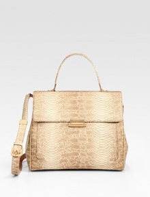 Rich snake-embossed leather tailored in a chic flap-front design.Top handle, 5¼ dropRemovable adjustable shoulder strap, 20-21¼ dropFlap closureProtective metal feetTwo inner compartmentsOne inside zip pocketFully lined12½W X 9H X 5½DImported