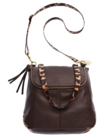 Add some urban-cool to your everyday accessorizing with this contemporary crossbody from American Rag. Posh leopard print and tassel zipper pulls accentuate the outside, while the generous, pocket-lined interior stashes your essentials in style. Add some urban-cool to your everyday accessorizing with this contemporary crossbody from American Rag. Posh leopard print and tassel zipper pulls accentuate the outside, while the generous, pocket-lined interior stashes your essentials in style.