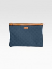 Nylon Guccissima trimmed with leather in a zip-top pouch.Top zip closureFully lined12W X 8½H X 1/4DMade in Italy Nylon Guccissima trimmed with leather in a zip-top pouch.Top zip closureFully lined12W X 8½H X 1/4DMade in Italy