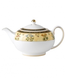 The exotic India dinnerware pattern presents a pattern of exquisitely detailed florals on a yellow and deep blue band against pure white bone china. The exotic India dinnerware pattern presents a pattern of exquisitely detailed florals on a yellow and deep blue band against pure white bone china.
