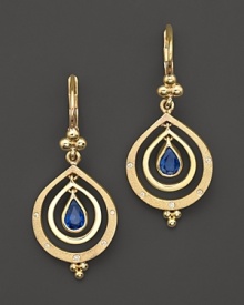 Blue sapphires with diamonds in 18 karat yellow gold earrings from Temple St. Clair. Blue sapphires with diamonds in 18 karat yellow gold earrings from Temple St. Clair.