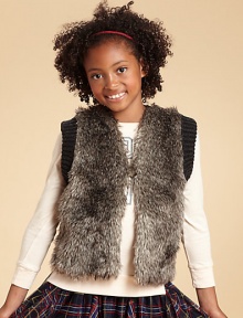 With a lush faux-fur front and a chunky knit back, this textural vest is a just-right blend of cozy and chic.Open front with button closureSleeveless with ribbed trimCotton liningFaux-fur front: 67% acrylic/17% modacrylic/16%polyesterSweater back: 63% acrylic/20% polyester/17% modacrylicDry cleanImported With a lush faux-fur front and a chunky knit back, this textural vest is a just-right blend of cozy and chic.Open front with button closureSleeveless with ribbed trimCotton liningFaux-fur front: 67% acrylic/17% modacrylic/16%polyesterSweater back: 63% acrylic/20% polyester/17% modacrylicDry cleanImported