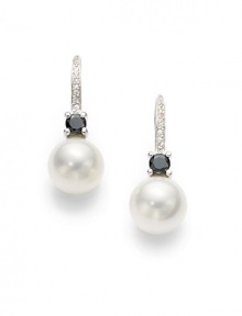 THE LOOKMother of pearl and black cubic zirconia accentsCurved setting with cubic zirconia detailsSterling silver rhodium-plated settingHook closureTHE MEASUREMENTLength, about 1¼ORIGINImported THE LOOKMother of pearl and black cubic zirconia accentsCurved setting with cubic zirconia detailsSterling silver rhodium-plated settingHook closureTHE MEASUREMENTLength, about 1¼ORIGINImported