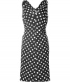 Stylish dress in a fine, black and white rayon-cotton blend - Fashionable polka dots - The dress is feminine, slim fit, falls soft, comfortable and flatters the figure - With a deep V-neckline, sleeveless - Pleasant mid-thigh length - Terribly versatile, suitable for the office and a cocktail party - Wear with pumps, peep toes, booties