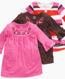 Pretty pleats. This tunic from Carter's is pretty to perfection, whether she love stripes or floral patterns. Pretty pleats. This tunic from Carter's is pretty to perfection, whether she love stripes or floral patterns.
