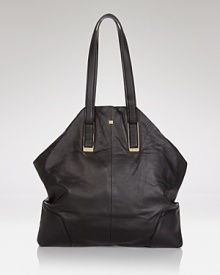 This Pour La Victoire tote is the last word in easy cool, ideally sized for every errand and outing. In leather, it's the new staple carryall. This Pour La Victoire tote is the last word in easy cool, ideally sized for every errand and outing. In leather, it's the new staple carryall.
