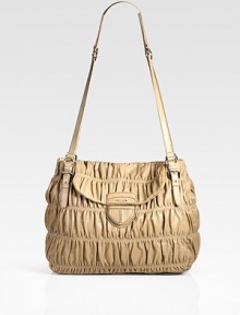 Lambskin leather finished with signature ruching, in a chic flap silhouette.Shoulder straps, 15 drop Flap and snap closure One inside zip pocket One inside open pocket Signature jacquard lining 17W X 12H X 6½D Made in Italy Lambskin leather finished with signature ruching, in a chic flap silhouette.Shoulder straps, 15 drop Flap and snap closure One inside zip pocket One inside open pocket Signature jacquard lining 17W X 12H X 6½D Made in Italy