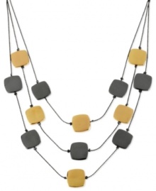 Doing the math with this illusion necklace from Kenneth Cole New York is a fun problem to have. Three rows of hematite- and gold-tone mixed metal square accents adds up to a stylish piece. Approximate length: 16 inches + 3-inch extender. Approximate drop: 2-1/5 inches.