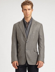 Expect the unexpected with this classically-inspired three-button blazer shaped in the supreme softness of a wool and cashmere blend, featuring a zip-out front vest panel and an additional front ticket pocket.Button-frontNotch lapelChest welt, waist flap pocketsSide vents86% wool/14% polyesterDry cleanMade in Italy