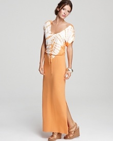 Flaunting a trend-right tie-dye print, waist-cinching tie and flirty side slits, this C&C California maxi dress exudes bohemian ease. Flaunting a trend-right tie-dye print, waist-cinching tie and flirty side slits, this C&C California maxi dress exudes bohemian ease.