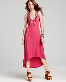 Take it easy in this fresh floor-skimming dress by C&C California. Simple in structure with a dramatic asymmetrical hem, this scoop neck tank dress carries you day through night. Take it easy in this fresh floor-skimming dress by C&C California. Simple in structure with a dramatic asymmetrical hem, this scoop neck tank dress carries you day through night.