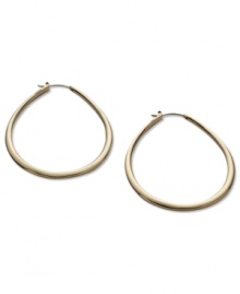 A classic hoop earring in a teardrop design from Fossil. Crafted in shiny gold tone stainless steel. Approximate diameter: 2-1/3 inches. A classic hoop earring in a teardrop design from Fossil. Crafted in shiny gold tone stainless steel. Approximate diameter: 2-1/3 inches.