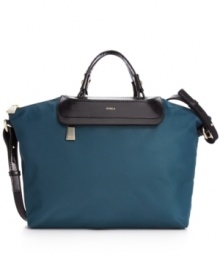 Finally, a go-everywhere carryall that's practical and posh. Crafted from durable nylon with leather trim and golden hardware, this exquisite Furla design is roomy enough for almost anything you wish to take along for workdays or weekends away. Finally, a go-everywhere carryall that's practical and posh. Crafted from durable nylon with leather trim and golden hardware, this exquisite Furla design is roomy enough for almost anything you wish to take along for workdays or weekends away.