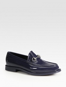 Rubber rain shoe with silver bit detail.Rubber sole embossed with Gucci scriptMade in Italy