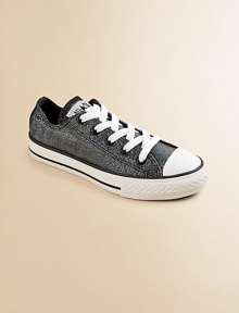 A traditional All Star, lace-up design with Chuck Taylor insole and rubber sole, crafted in shimmery cotton.Lace-upCotton upperTextile liningRubber soleTraditional chuck insoleImported A traditional All Star, lace-up design with Chuck Taylor insole and rubber sole, crafted in shimmery cotton.Lace-upCotton upperTextile liningRubber soleTraditional chuck insoleImported