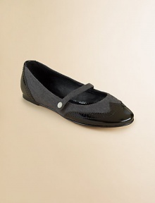 Charming Mary Janes flats are crafted in shiny patent leather with wool in a wingtip silhouette.Slip-on with top strapPatent leather and wool upperLeather liningLeather soleImported Charming Mary Janes flats are crafted in shiny patent leather with wool in a wingtip silhouette.Slip-on with top strapPatent leather and wool upperLeather liningLeather soleImported