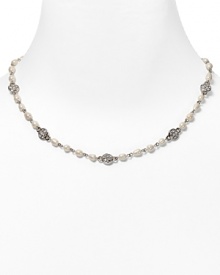 This charming necklace from Lauren by Ralph Lauren features crystal stones and glass pearls.