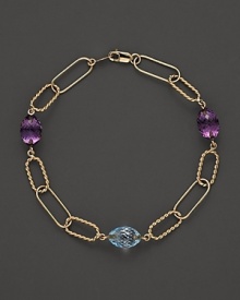 Faceted oval amethyst and blue topaz add rich sparkle to links of 14K yellow gold. By Nancy B.